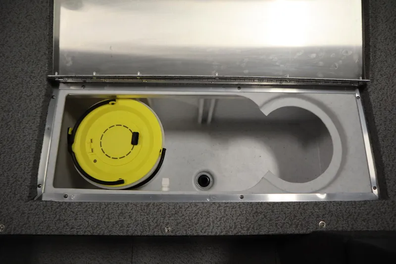 Slide: The Image of 2026 Lowe Fishing Machine 1625SC interior with steering console and seat. - 17