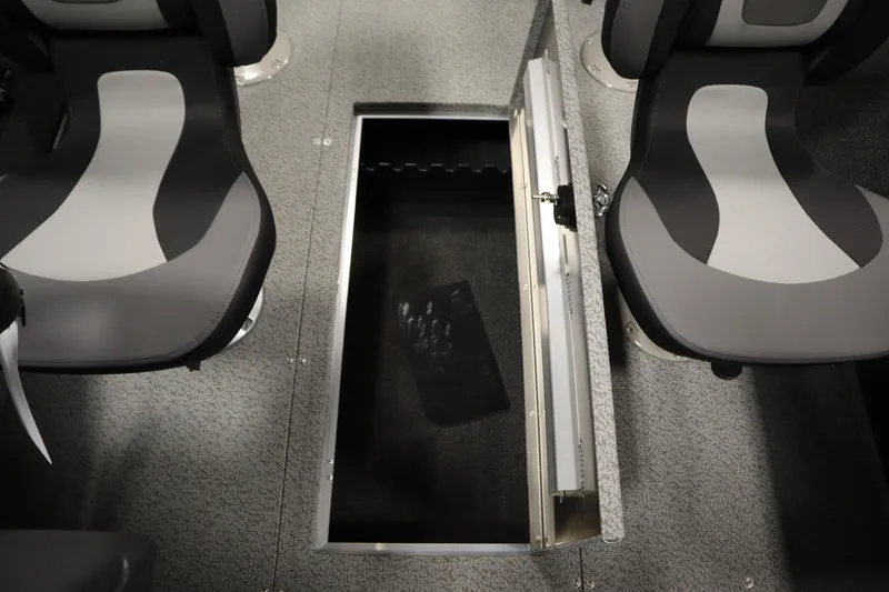 Slide: The Image of 2026 Lowe Fishing Machine 1625SC interior with two gray and black seats. - 29