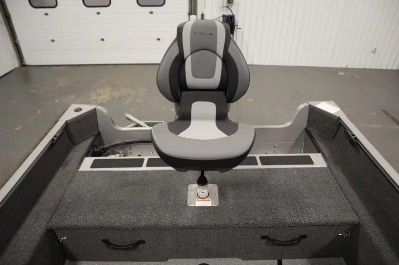 Slide: The Image of 2026 Lowe Fishing Machine 1625SC boat interior with a comfortable swivel seat. - 30