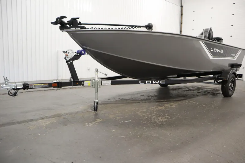 Slide: The Image of 2026 Lowe Fishing Machine 1625SC trailer wheel and tire detail. - 35