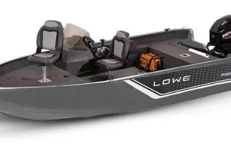 Slide: The Image of 2026 Lowe Fishing Machine 1625SC boat on trailer in a garage setting. - 38