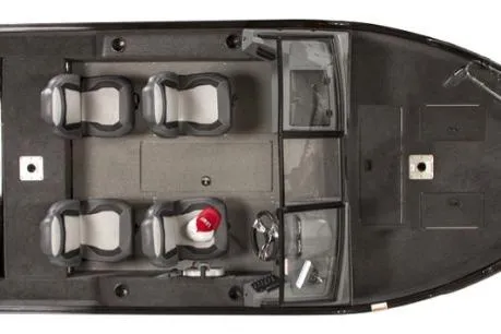 Slide: The Image of 2026 Lowe Fishing Machine 1625WT in a garage, showcasing sleek design and modern features. - 2