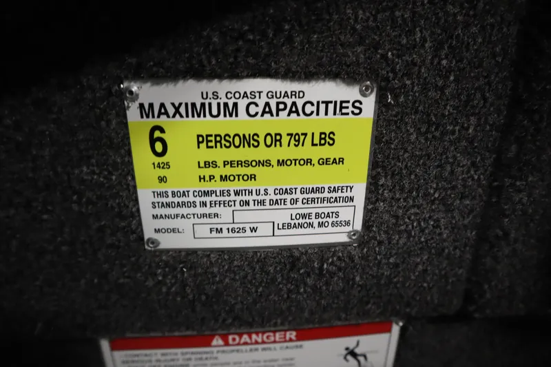 Slide: The Image of Capacity label for Lowe Fishing Machine 1625WT, 2026 model, showing U.S. Coast Guard compliance. - 27