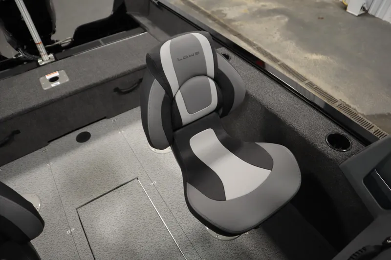 Slide: The Image of 2026 Lowe Fishing Machine 1625WT interior with modern seating design. - 32