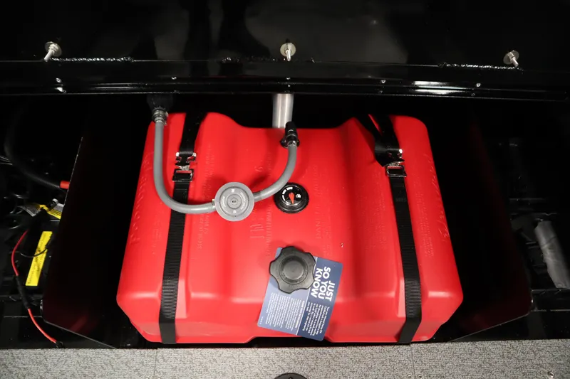 Slide: The Image of Red fuel tank in 2026 Lowe Fishing Machine 1625WT boat, secured with straps. - 35