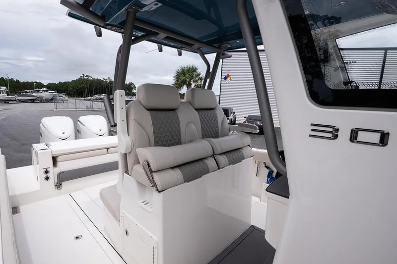 Slide: The Image of 2026 Solace 30 CS boat interior with dual seats and modern design. - 22