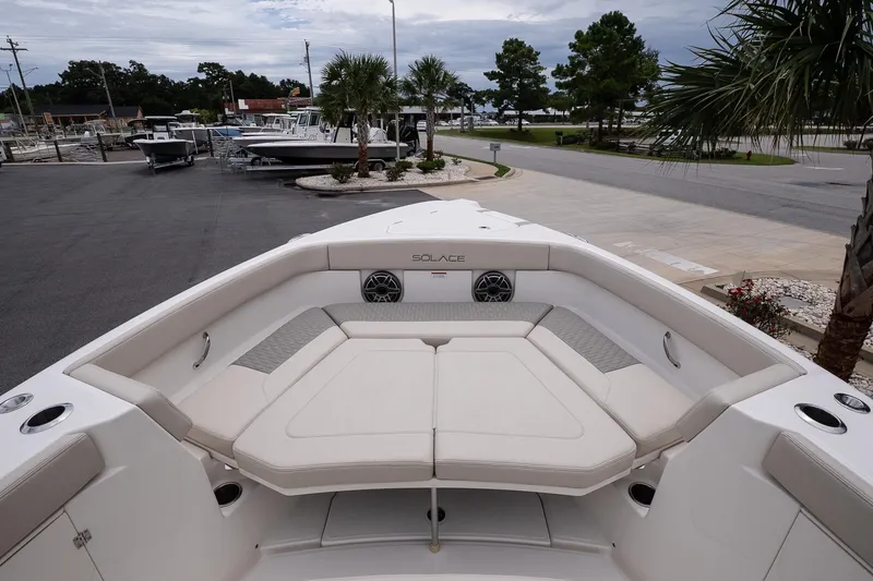 Slide: The Image of 2026 Solace 30 CS boat with spacious seating and modern design. - 26