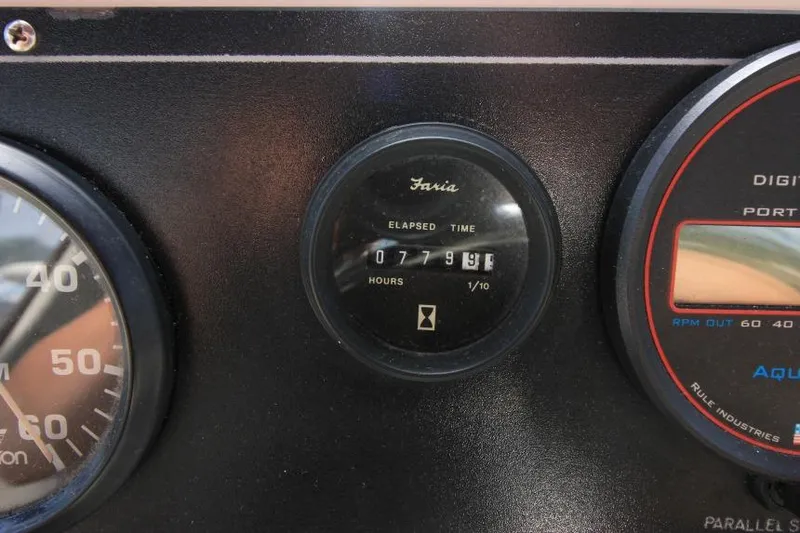 Slide: The Image of Hour meter on 1990 Silverton 40 Aft Cabin, showing 779.9 hours elapsed. - 13