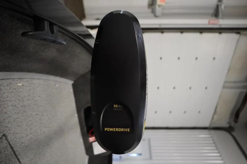 Slide: The Image of PowerDrive motor on 2026 Lowe Fishing Machine 1675SC boat, indoor setting. - 11