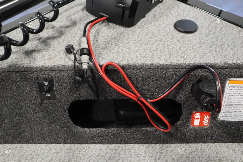 Slide: The Image of 2026 Lowe Fishing Machine 1675SC boat wiring and control panel close-up. - 14