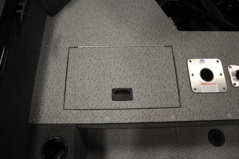 Slide: The Image of 2026 Lowe Fishing Machine 1675SC deck with storage compartment and fittings. - 35