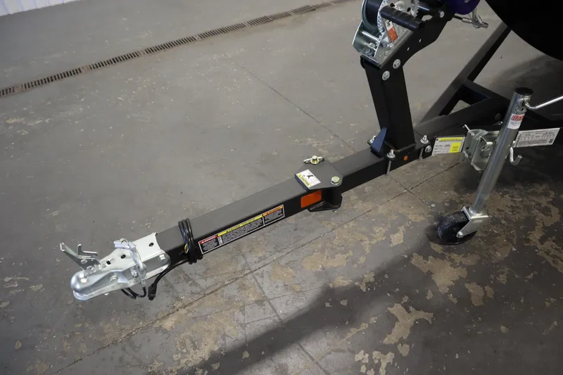 Slide: The Image of Trailer hitch of 2026 Lowe Fishing Machine 1675SC on concrete floor. - 41