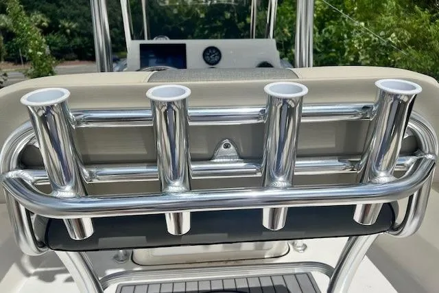 Slide: The Image of 2025 Key West 203 FS boat rod holders and console detail. - 11
