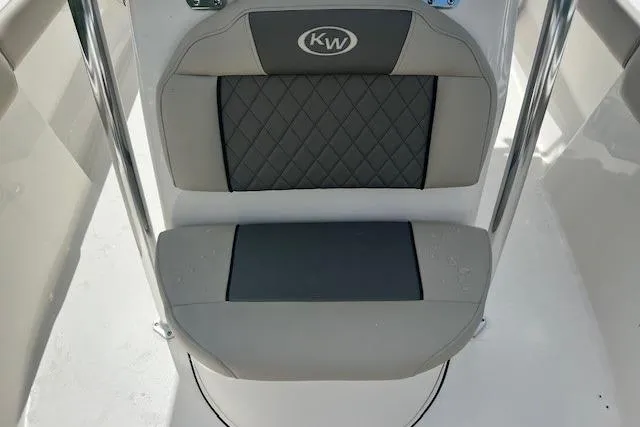 Slide: The Image of 2025 Key West 203 FS boat seat with quilted design and KW logo. - 6