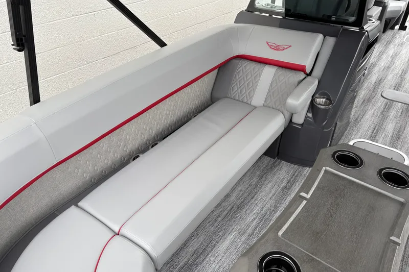 Slide: The Image of Luxurious seating on 2026 Bennington 24 MFB boat with elegant design and cup holders. - 17