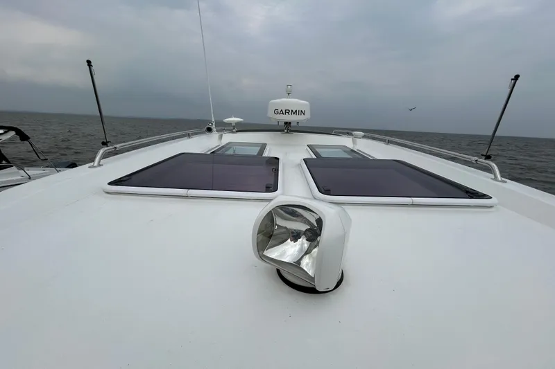 Slide: The Image of 2024 Beneteau Antares 11 boat deck with Garmin equipment, ocean view. - 1