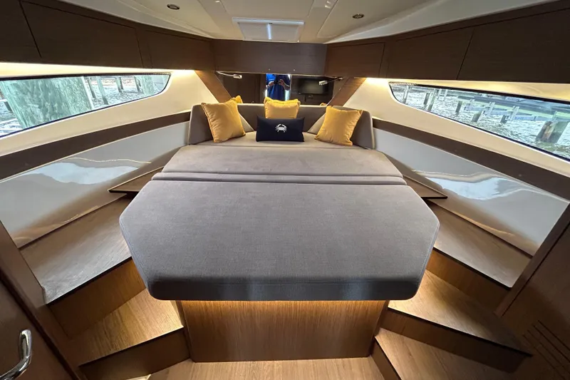 Slide: The Image of 2024 Beneteau Antares 11 cabin interior with modern design and comfortable seating. - 24