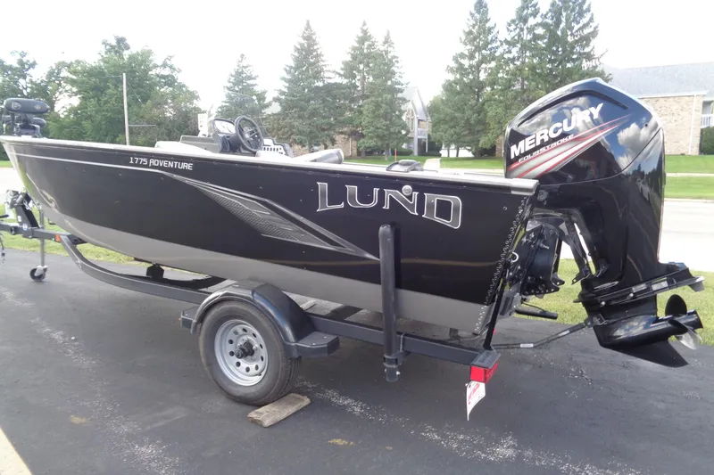 Slide: The Image of 2022 Lund 1775 Adventure SS boat with Mercury outboard motor on trailer. - 24