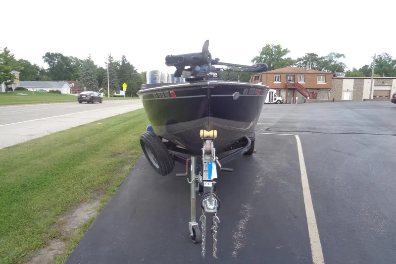 Slide: The Image of 2022 Lund 1775 Adventure SS boat on trailer in parking lot. - 30