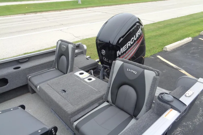 Slide: The Image of 2022 Lund 1775 Adventure SS boat interior with Mercury outboard motor. - 6