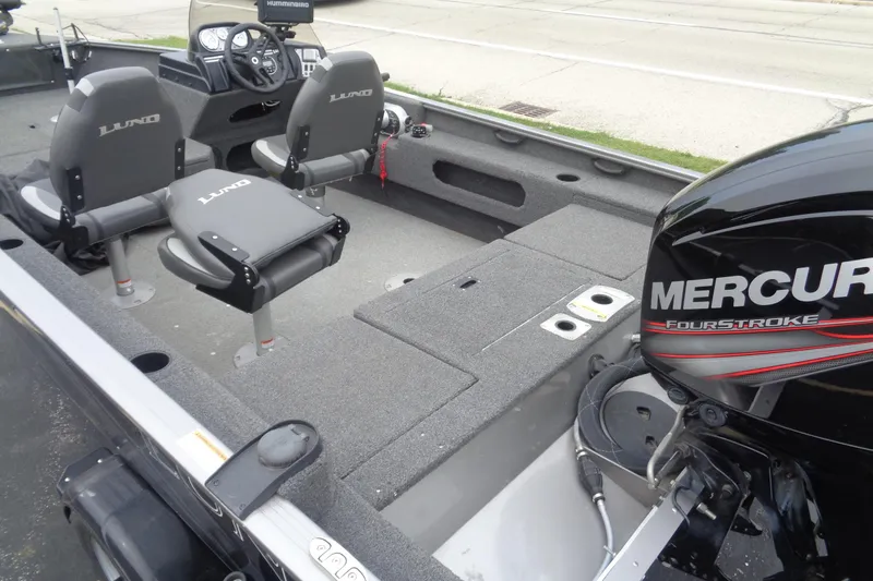 Slide: The Image of 2022 Lund 1775 Adventure SS boat interior with Mercury FourStroke engine. - 7