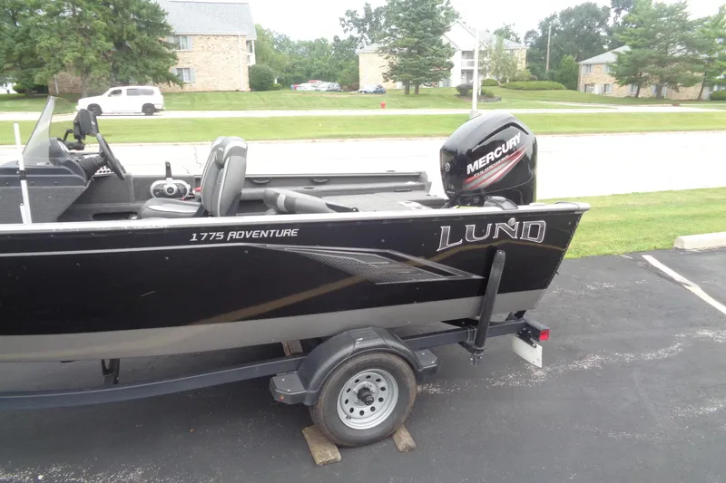 Slide: The Image of 2022 Lund 1775 Adventure SS boat with Mercury outboard motor on trailer. - 9