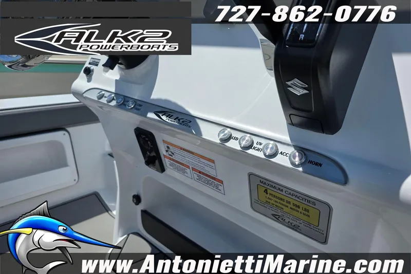 Slide: The Image of 2025 ALK2 Powerboats 22BHX FLATS/BAY HYBRID dashboard with controls and branding. - 10