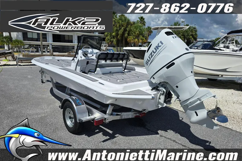 Slide: The Image of 2025 ALK2 Powerboats 22BHX Flats/Bay Hybrid with Suzuki engine on trailer. - 2