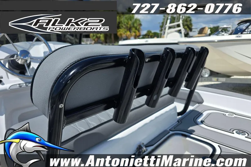 Slide: The Image of 2025 ALK2 Powerboats 22BHX FLATS/BAY HYBRID interior with rod holders and steering wheel. - 6