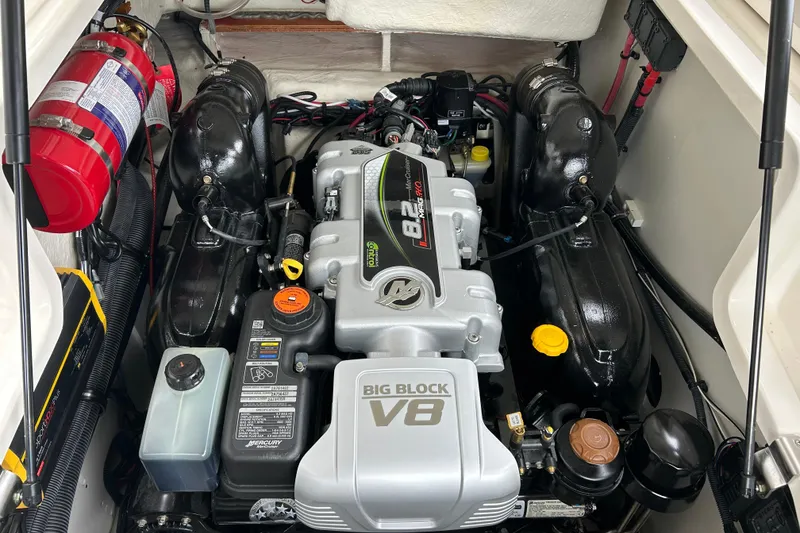Slide: The Image of Engine compartment of 2023 Sea Ray SLX 260 with Big Block V8 engine. - 13