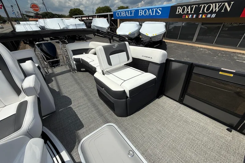 Slide: The Image of 2024 Barletta CORSA 23QSS pontoon boat interior with seating and deck view. - 11