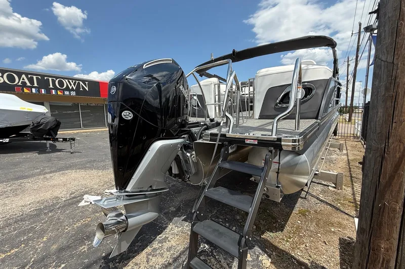 Slide: The Image of 2024 Barletta CORSA 23QSS pontoon boat with powerful outboard motor at Boat Town. - 5