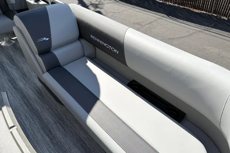 Slide: The Image of 2026 Bennington 21 SSR boat interior with gray and black seating. - 12