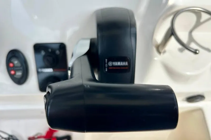 Slide: The Image of Close-up of Yamaha throttle control on 2022 Key West 219 FS boat. - 22