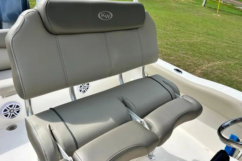 Slide: The Image of 2022 Key West 219 FS boat seat with gray upholstery and stainless steel accents. - 30