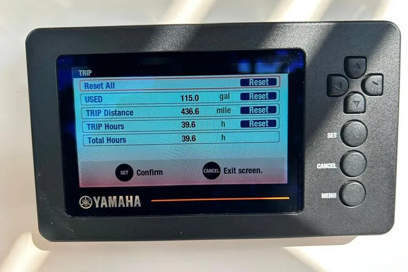 Slide: The Image of Yamaha display showing trip data: 115 gallons used, 436.6 miles, 39.6 hours. Key West 219 FS. - 40