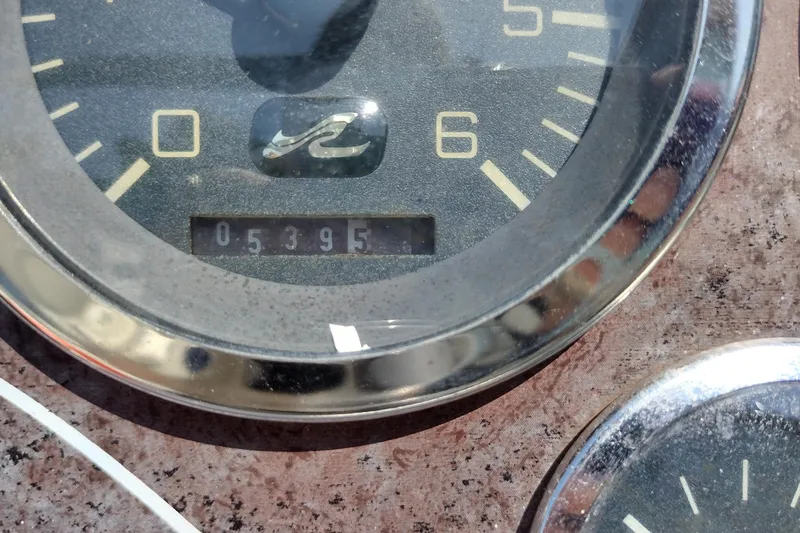 Slide: The Image of Close-up of 1999 Sea Ray 215 Express Cruiser gauge showing 539.5 hours. - 10