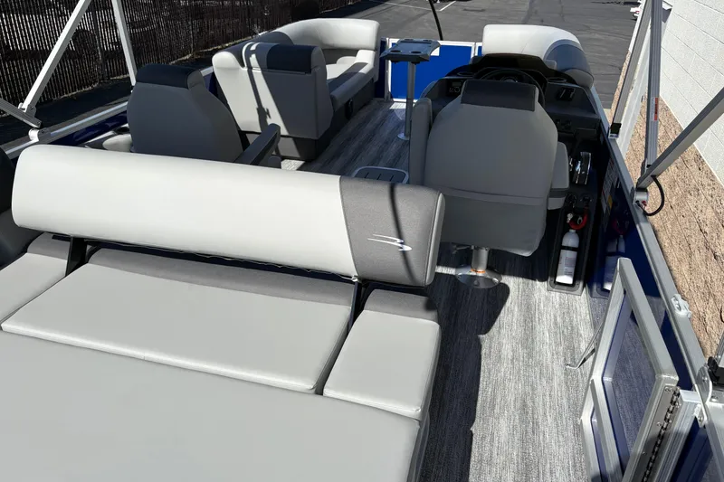 Slide: The Image of 2026 Bennington 21 SSB pontoon boat interior with gray seating and modern design. - 4