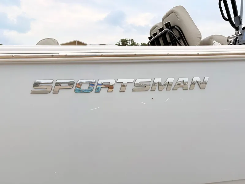 Slide: The Image of 2022 Sportsman 241 Heritage boat logo on side panel, featuring sleek design. - 49