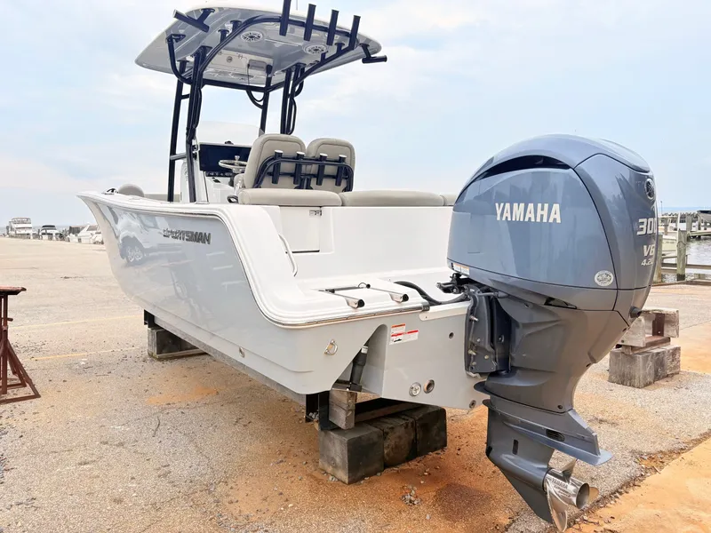 Slide: The Image of 2022 Sportsman 241 Heritage boat with Yamaha 300 V6 engine on display. - 8