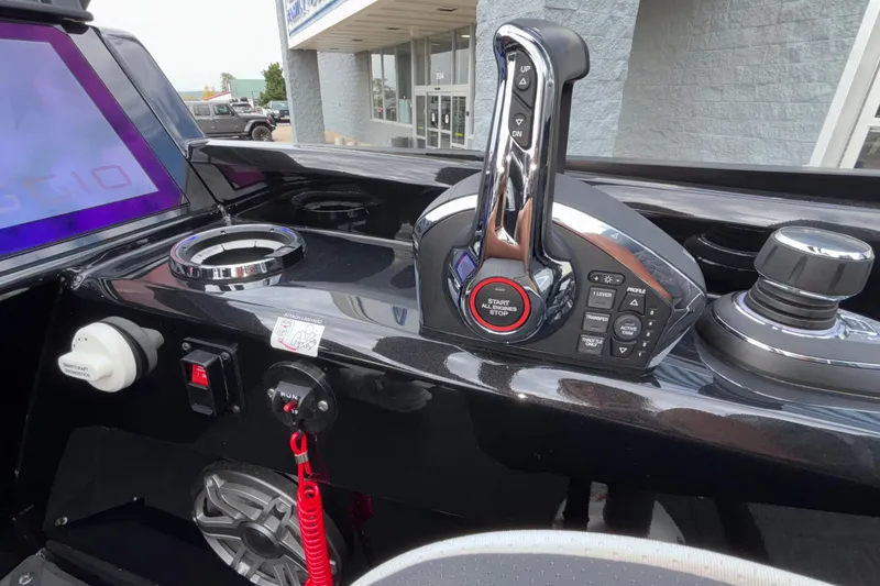 Slide: The Image of Control panel of 2026 Viaggio D28UW A-T boat with modern throttle and start-stop button. - 11