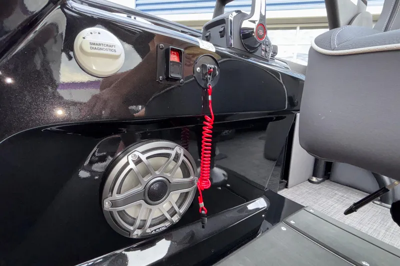 Slide: The Image of Interior of 2026 Viaggio D28UW A-T boat with speaker and SmartCraft diagnostics. - 13