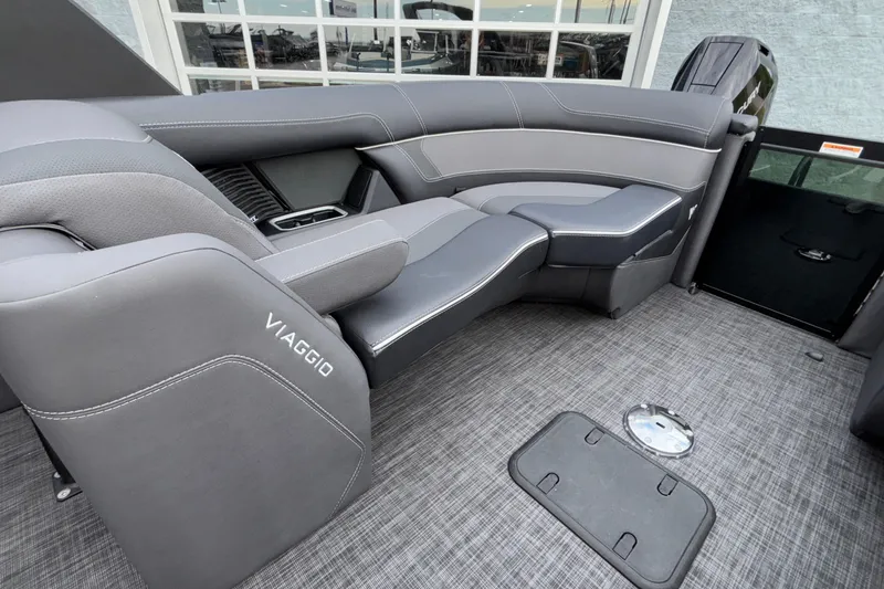 Slide: The Image of Luxurious interior of 2026 Viaggio D28UW A-T boat with sleek gray seating. - 16