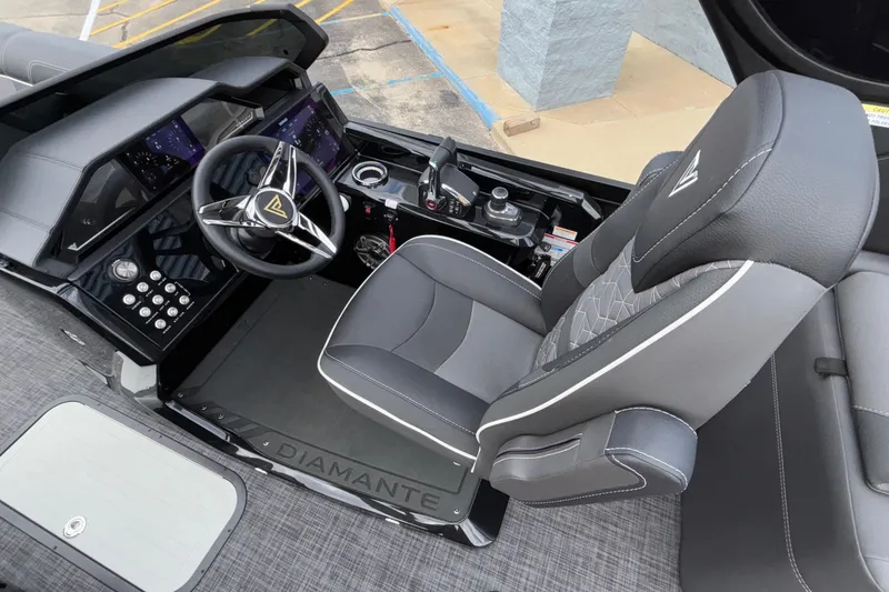 Slide: The Image of 2026 Viaggio D28UW A-T boat cockpit with modern steering and comfortable seating. - 19