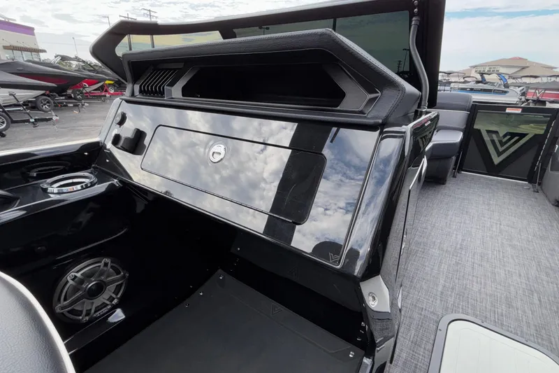 Slide: The Image of 2026 Viaggio D28UW A-T boat interior with sleek black dashboard and modern design. - 24