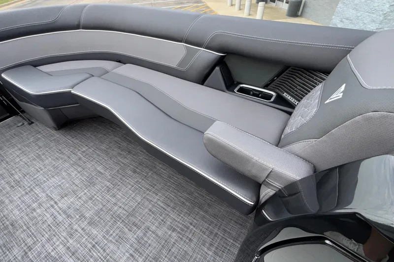 Slide: The Image of Luxurious seating in the 2026 Viaggio D28UW A-T boat, featuring sleek gray upholstery. - 31