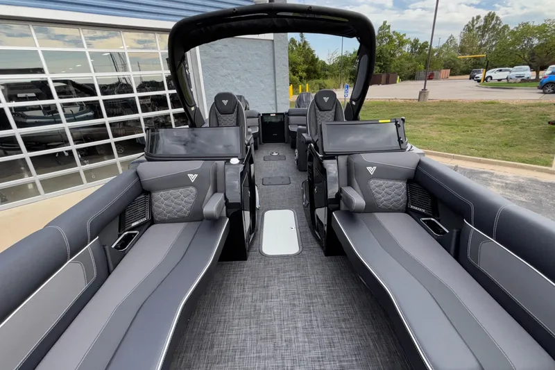 Slide: The Image of Luxurious 2026 Viaggio D28UW A-T pontoon boat interior with sleek gray seating and modern design. - 32