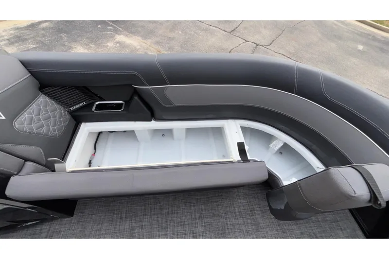 Slide: The Image of 2026 Viaggio D28UW A-T boat interior with open storage compartment and sleek seating design. - 44