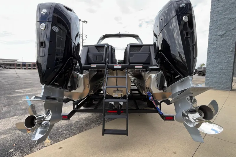 Slide: The Image of 2026 Viaggio D28UW A-T boat with dual outboard motors, rear view. - 5