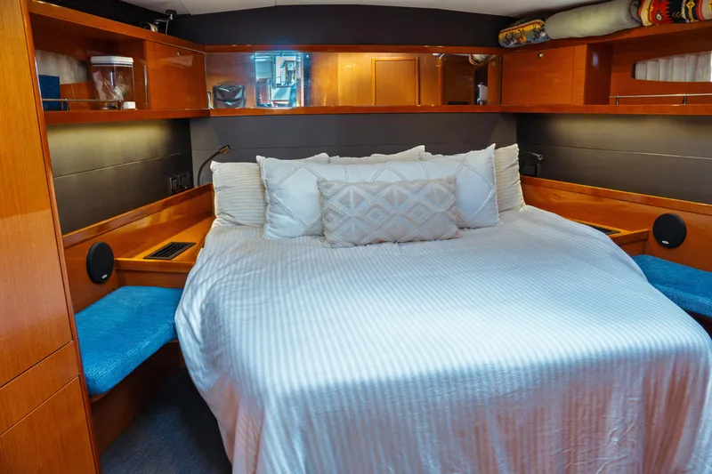 Slide: The Image of Luxurious cabin interior of 2016 Beneteau Oceanis 60 yacht with cozy bedding. - 12